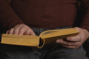 person holding a open book
